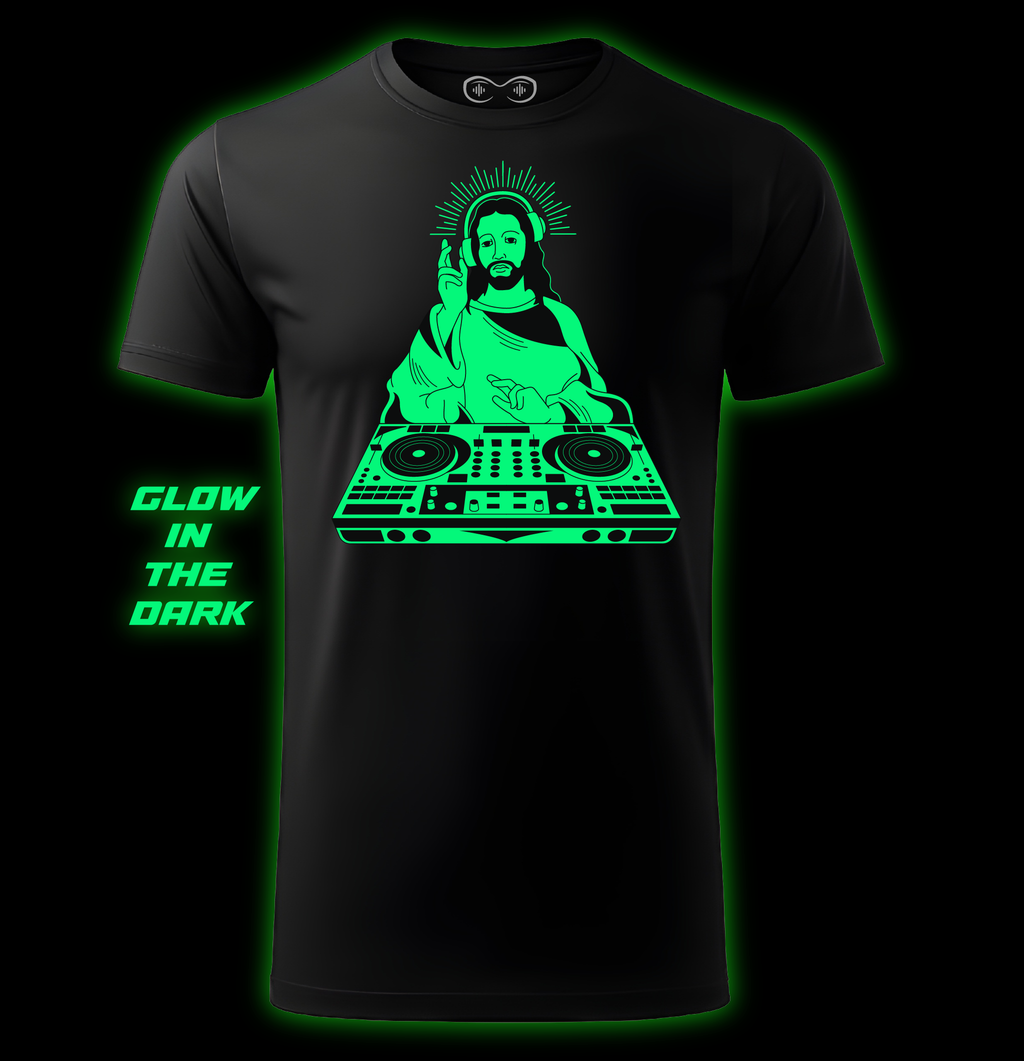 Black t-shirt with a green glow-in-the-dark design of a person on a DJ turntable, labeled 'Glow in the Dark'.